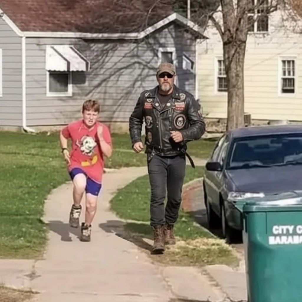 The biker has been running with my autistic son every morning and I just found out why!
