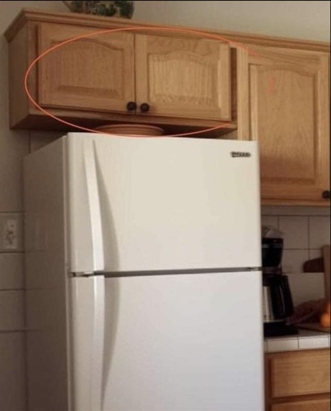 Here’s what the cupboards above your fridge are for